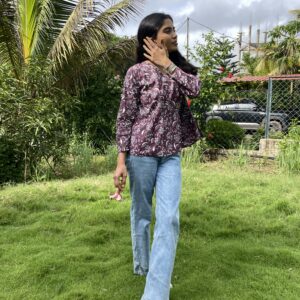 Wine shade peplum top kurti with floral prints, modern chic style.