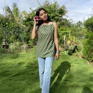 Green sleeveless kurti with tie-up straps, trendy and stylish